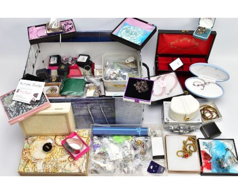 A BOX OF COSTUME JEWELLERY, to include two enamel brooches by Fish, a hinged bangle, various brooches, necklaces, bracelets, 