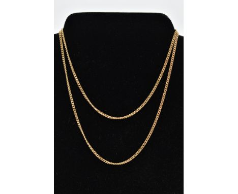 A YELLOW METAL CURB LINK CHAIN, fitted with a spring clasp stamped '750', length 700mm, approximate gross weight 15.4 grams (
