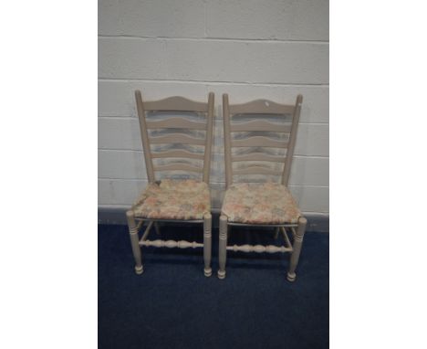 A SET OF EIGHT PAINTED LADDER BACK DINING CHAIRS (picture of two chairs, six in storage)
