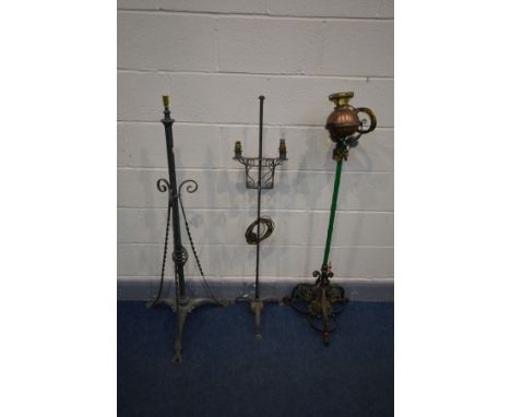THREE VARIOUS VINTAGE WROUGHT IRON STANDARD LAMPS of various styles and ages