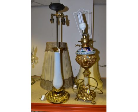 TWO TABLE LAMPS WITH GILT METAL MOUNTS, comprising a twin light lamp on a white glazed porcelain baluster pedestal with folia