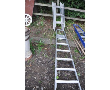 AN ALUMINIUM STEP LADDER 190cm high and a four section collapsible ladder 90cm each section (estimate 2.7m in length) (2)