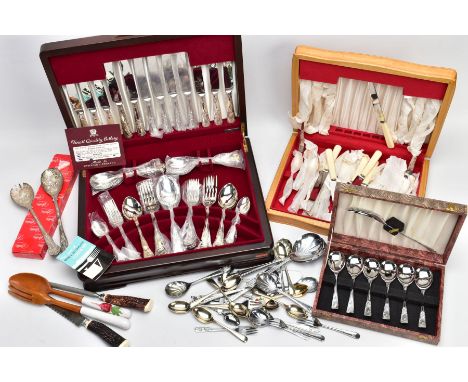 TWO CASED SETS OF PLATED CUTLERY, A CASED SPOON SET, LOOSE SPOONS, A CARVING SET AND SALAD UTENSILS, to include number of col