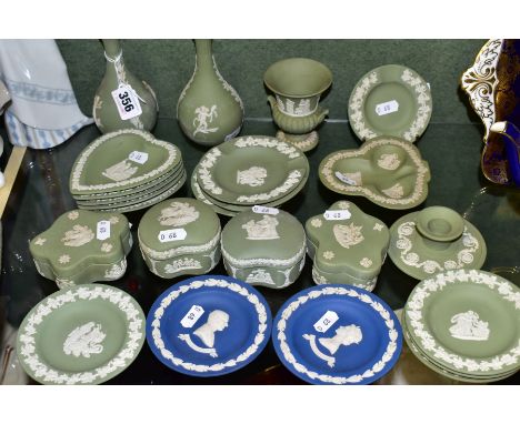 A GROUP OF WEDGWOOD JASPERWARES, mostly green, comprising two green bud vases, an urn shaped vase, four ashtrays, four covere