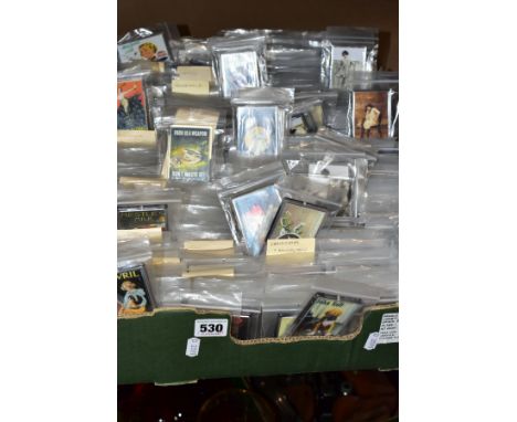 A QUANTITY OF FRIDGE MAGNETS, mainly vintage advertising or Victorian/Edwardian risque postcards