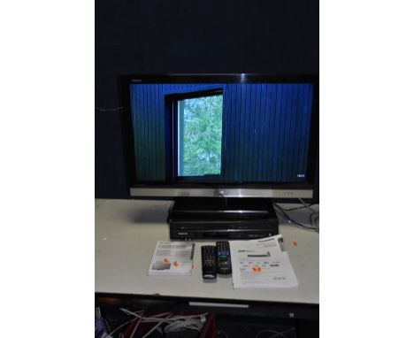 A SHARP AQUOS LC-32LE600E 32in TV with remote and manual and a Panasonic DVD recorder with remote and manual (both PAT pass a