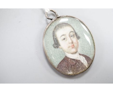 Late 18th century English School, oil on ivory, Miniature portrait of a  gentleman in a brown coat 3.5x3cm