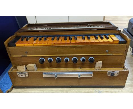 A hardwood cased harmonium