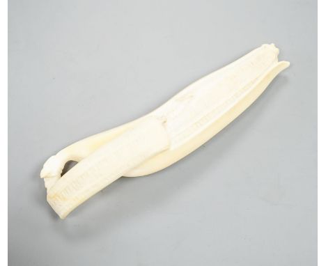 A Japanese carved ivory model of a partially peeled banana c.1900, 16cm