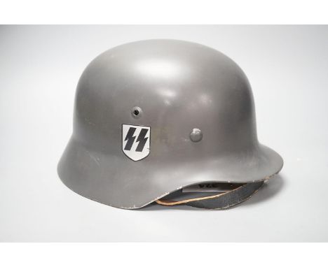 A replica WWII German steel helmet