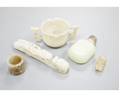 A Chinese jade belt hook, 12.5cm an archer's ring and figure, a stone cup and a glass snuff bottle