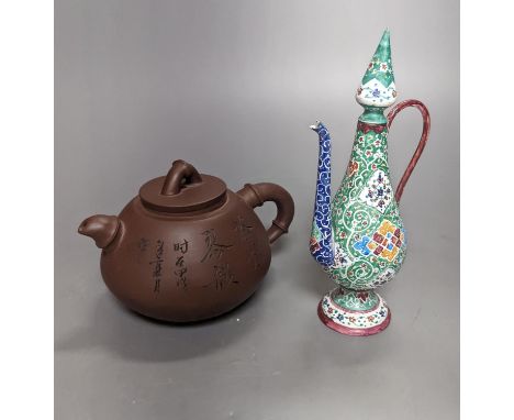 A Chinese Yixing teapot and a Isfahan enamel on copper ewer, 16.5cm high
