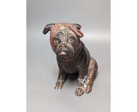 An Austrian cold painted terracotta model of a dog wearing a bandana, 21.5cm high