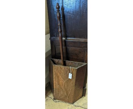 An early 20th century embossed copper stick stand, height 60cm, together with a Victorian copper warming pan