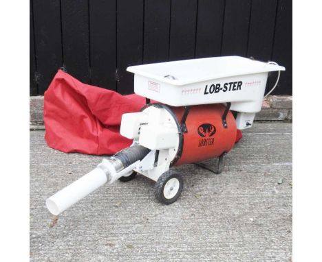 A Lob-ster tennis ball machine
