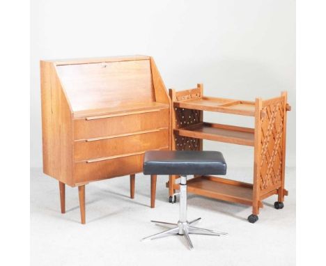 A 1960s teak bureau, together with a two tier drinks trolley and a stool (3)74w x 40d x 101h cm