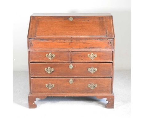 A George III oak and inlaid bureau, on bracket feet91w x 56d x 100h cm