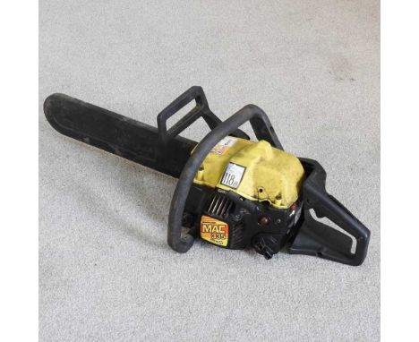 A Mac 335 petrol chainsaw, 73cm long