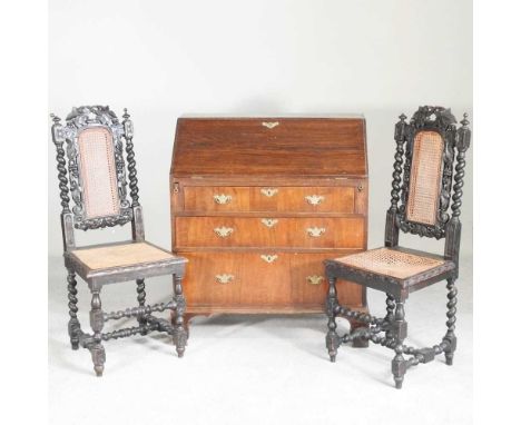 A 19th century oak bureau, together with a pair of 19th century heavily carved side chairs (3)88w x 50d x 101h cm