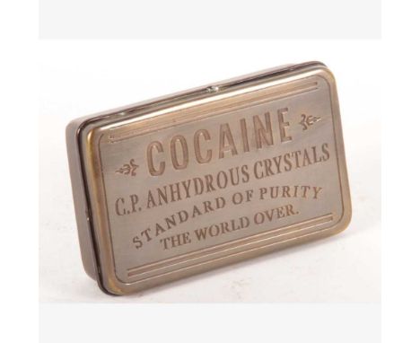 A reproduction brass tobacco box