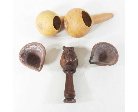 A 19th century treen novelty nutcracker, in the form of a pig, 14cm high, together with two gourds and two earthenware oil la