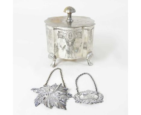 A William IV silver whisky decanter label, London 1834, 9cm wide, together with a silver port label and a plated tea caddy (3