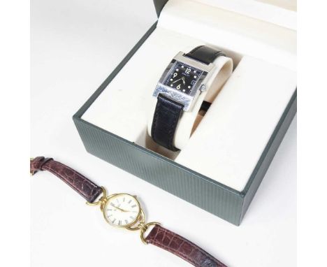 A Gucci ladies wristwatch, on a black leather strap, boxed, together with another on a brown leather strap (2)Overall conditi