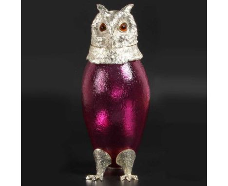 A modern plated novelty cranberry glass claret jug, in the form of an owl, 29cm high