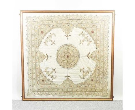 An Indian embroidered silk shawl, mounted and framed, 118 x 122cm