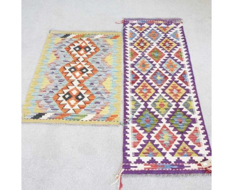 A kilim runner, with all over coloured diamonds, 150 x 50cm, together with another kilim, 97 x 62cm (2)