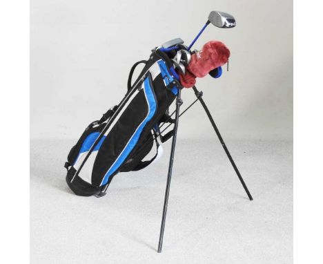 A set of ladies golf clubs, together with a golf bag