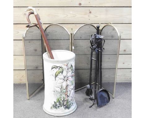 A continental pottery stick stand, 47cm high, together with a shooting stick, walking stick, fire tools and a screen