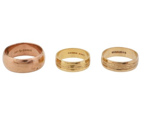 A 18ct gold band engraved abstract design marked ‘750’ together with two 9ct gold bands marked ‘9.375’ (3)approx. weight 11.4