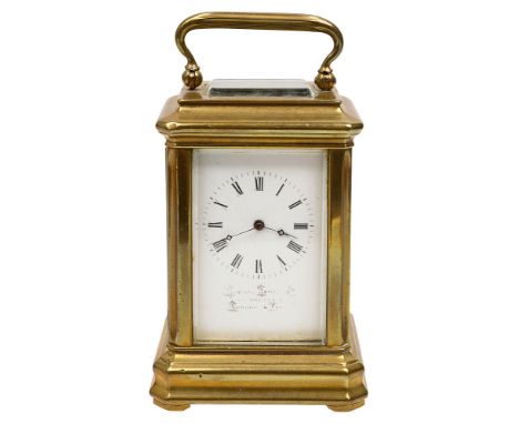 An early 20th century French miniature carriage clock retailed by Howell James white enamel dial with black Roman numerals, m