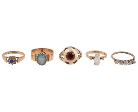 Five assorted rings,the shanks either stamped or hallmarked '9ct' or  '375', one set with an oval opal with diamond detailcom