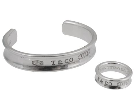 A matching silver bangle and ring by Tiffany &amp; Co. the bangle marked '925 T&amp;CO 1837' and stamped '1997 Tiffany &amp; 