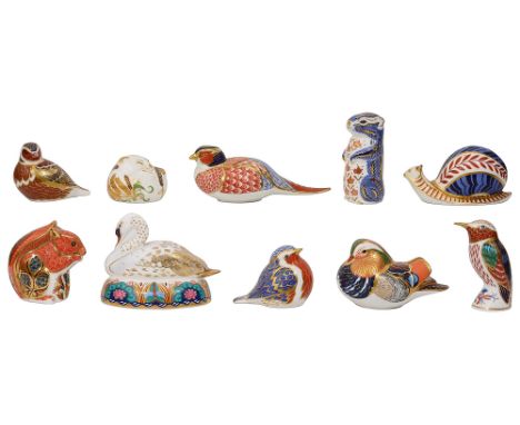 A collection of ten Royal Crown Derby paperweightsincluding a Mandarin Duck, a Pheasant, a Swan, a King fisher, a Red Squirre