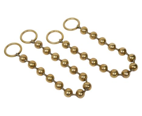 A pair of Victorian brass bead curtain tie backsarticulated and with ringslength 60.5cm.Condition:Occasional Knocks and dings