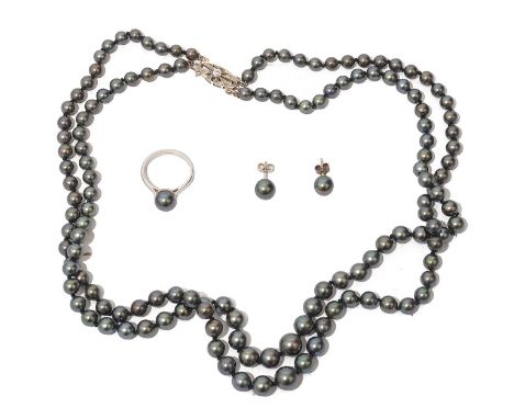 A black cultured  pearl suitecomprising a two row graduated 9mm - 5mm necklace to the 9ct white gold oval openwork clasp  wit