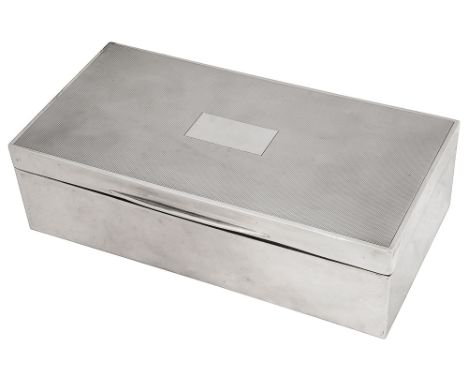 A George VI silver table cigarette boxBirmingham, 1941, D Bros, Dublin import marks for 1941plain rectangular form with hinge