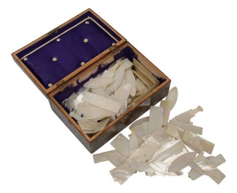 A collection of 19th century Chinese mother of pearl gaming countersvarious, elliptical, rectangular, some shaped as fish, wi