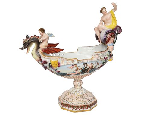 A continental porcelain centrepiece pedestal bowlearly 20th centurymodelled as a boat with dragon prow ridden by a putto and 