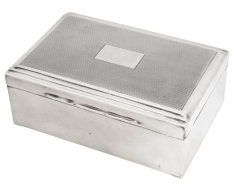 A George VI silver table cigarette boxBirmingham, 1950, William Adams, plain rectangular form, the engine turned lid with ste