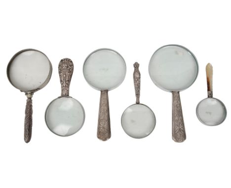 A group of six magnifying glasseshandles late 19th/early 20th centurymetal frames and glass later to five examples, to includ