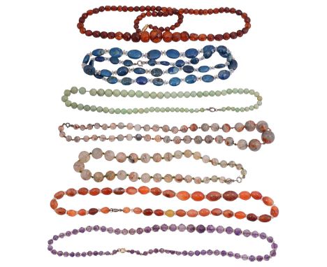 An amethyst and rock crystal bead necklace and other hardstone necklacesfirst graduated faceted amethyst beads with faceted r
