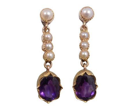 A pair of Edwardian amethyst and seed pearl ear pendants,  each set with a line of seed peelers to the articulated amethyst c