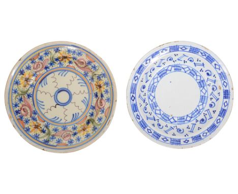 Two 19th century French faience tin glazed earthenware chargersfirst polychrome decorated in red, green, yellow, ornage and b