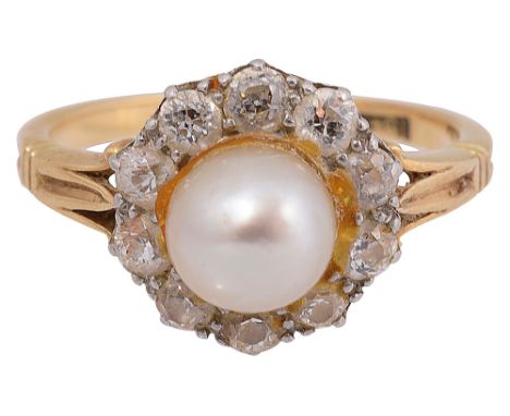 A pearl and diamond-set cluster ringthe central pearl (untested) measuring 6.5mm in diameter to the border of old-cut diamond