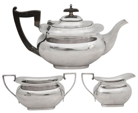 A George V silver three piece tea setSheffield, 1926, Walker &amp; Hall, to include a teapot, cream jug and twin handled suga