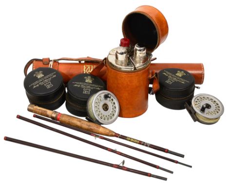 A Hardy leather cased 'Graphite Smuggler De luxe' fishing rod and other accessoriesthe canvas sectioned interior with seven r